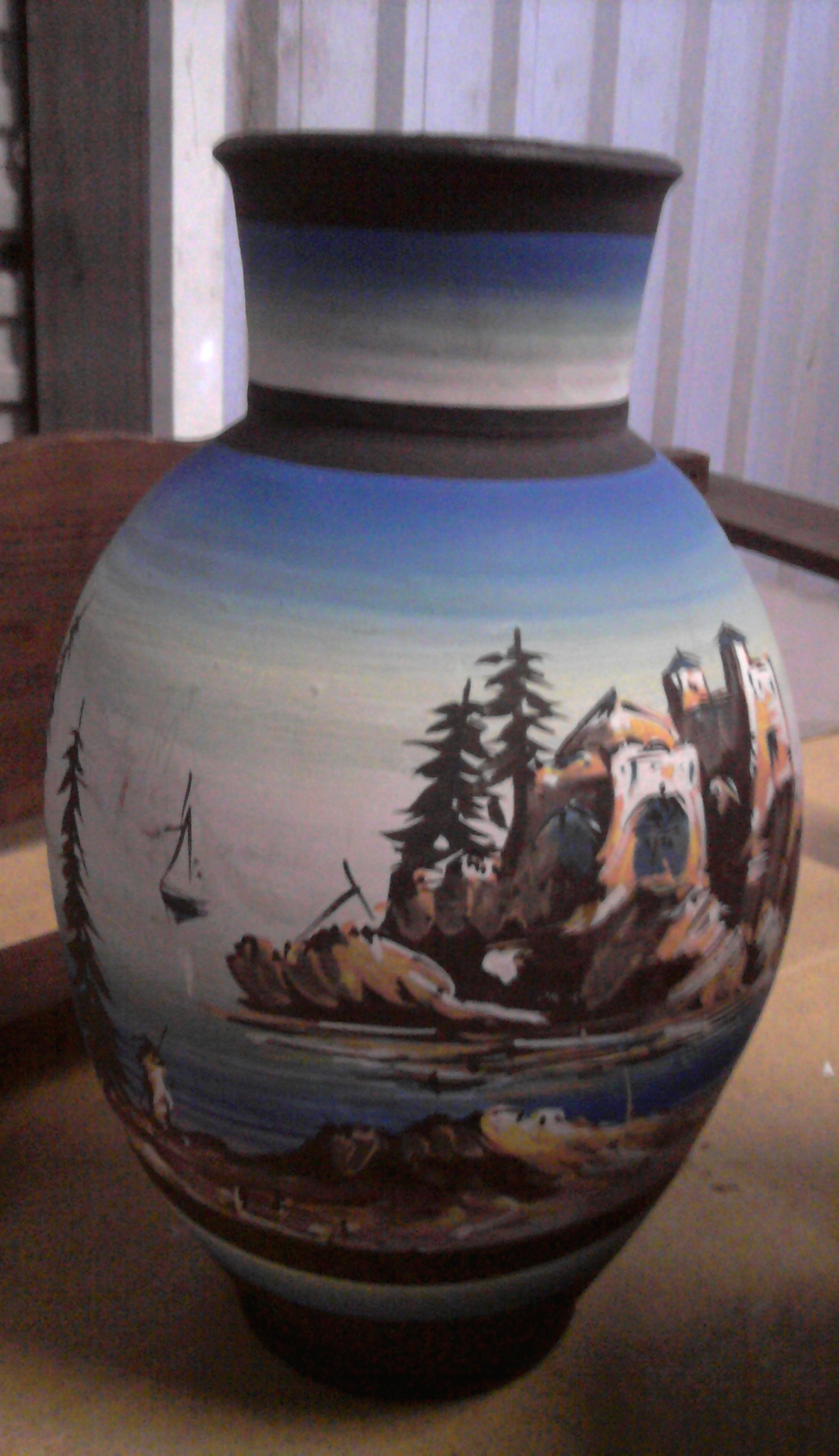 nice vase with an scenery painting