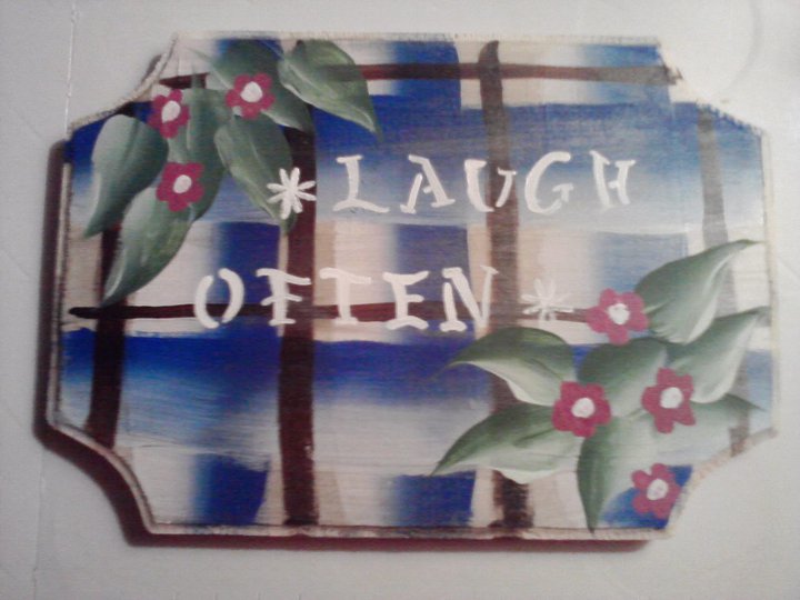 Laugh often wall sign