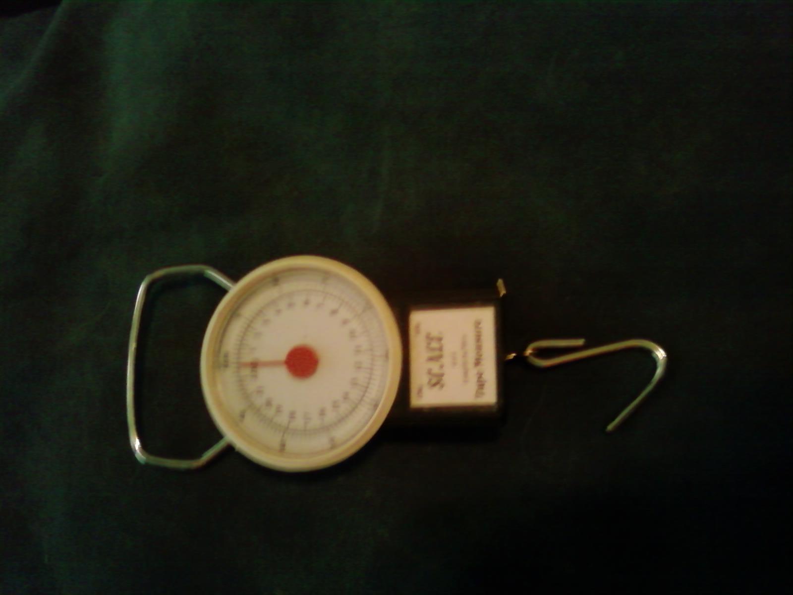 Hand held scale (weight) and length tape measure (up to 39 inches