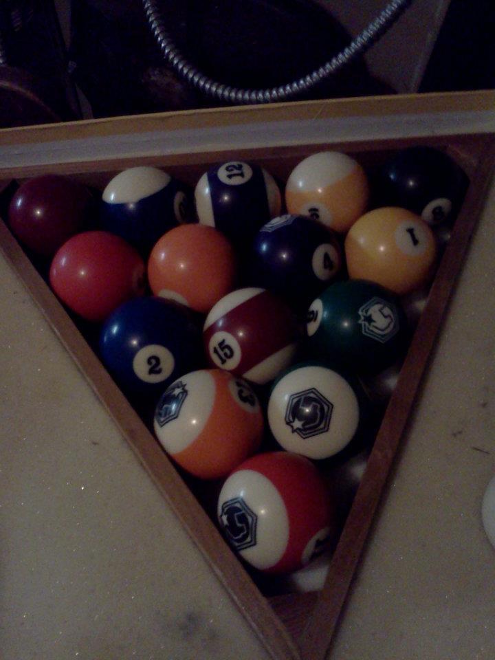 Pool table balls in box