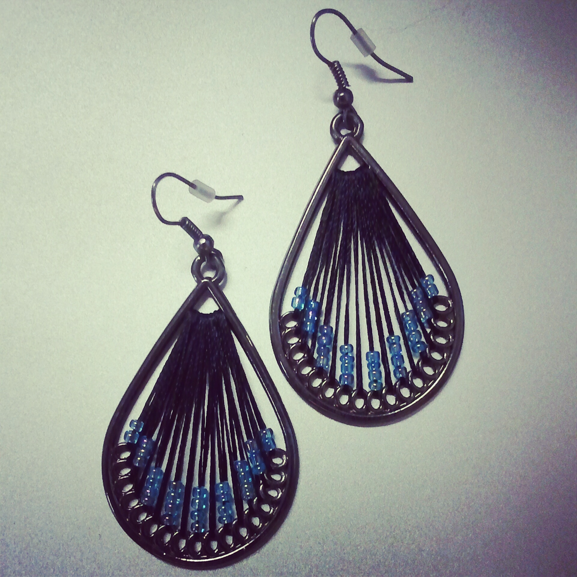 metal, fabric and bead peacock earrings