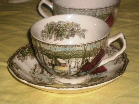 The Friendly Village \"Ice House\" Tea Cup and Saucer