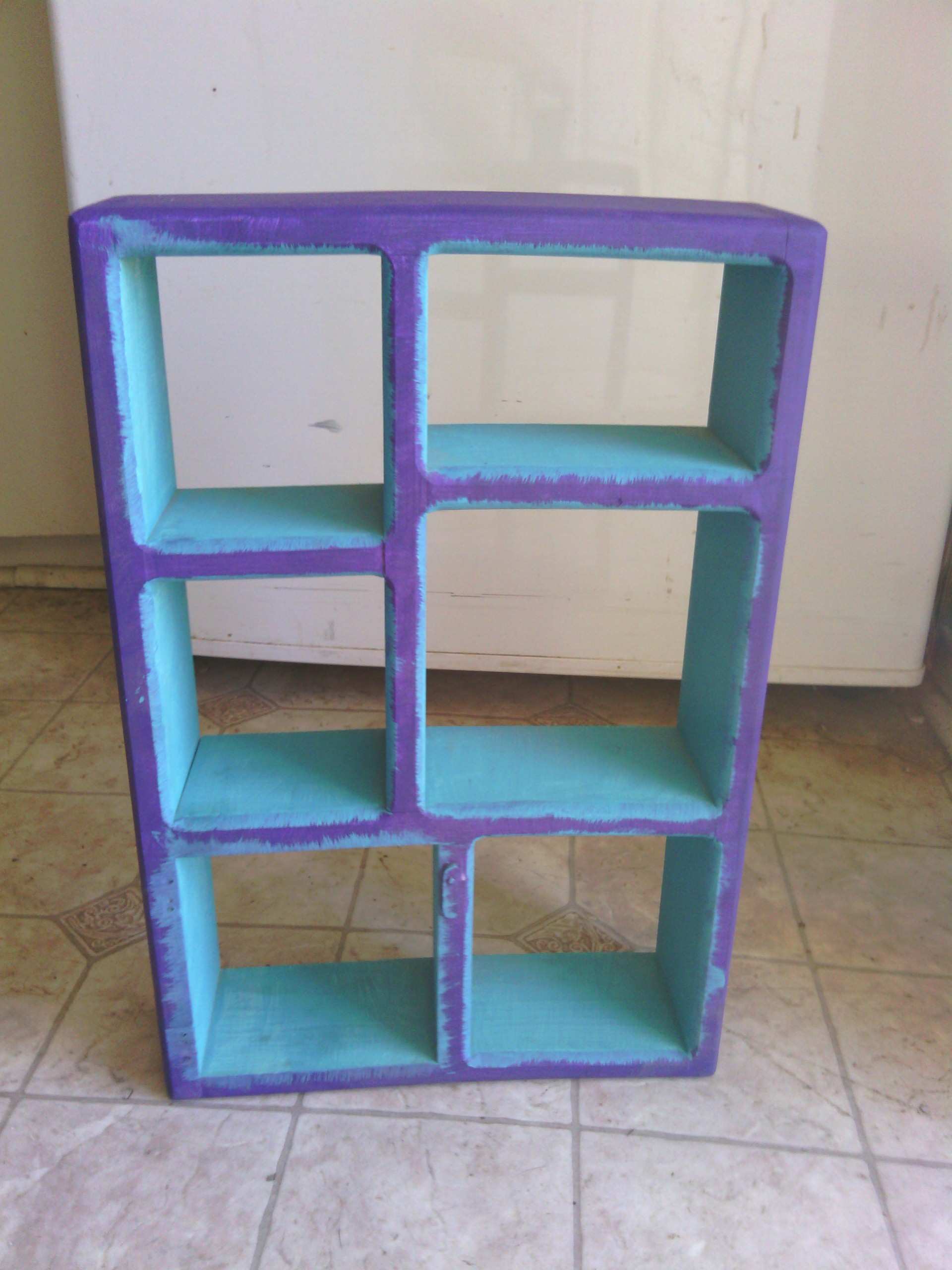 purple and turquoise shelf can be repainted