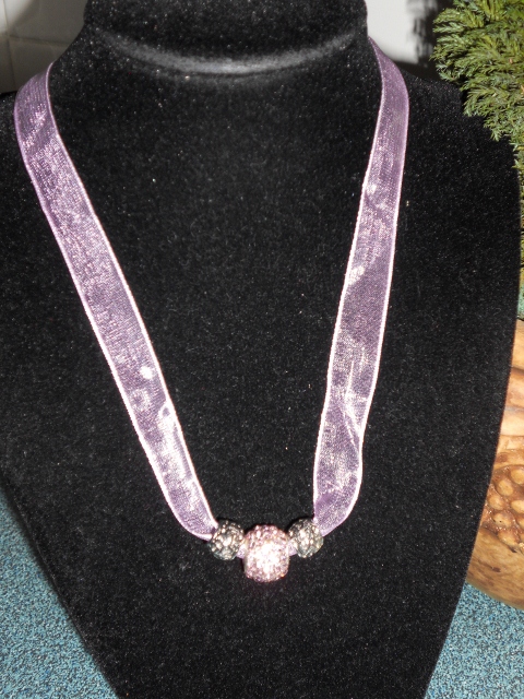 Pink crystal studded ribbon necklace