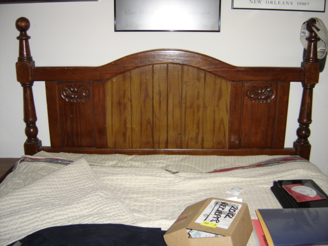 Queen-sized bed frame and headboard