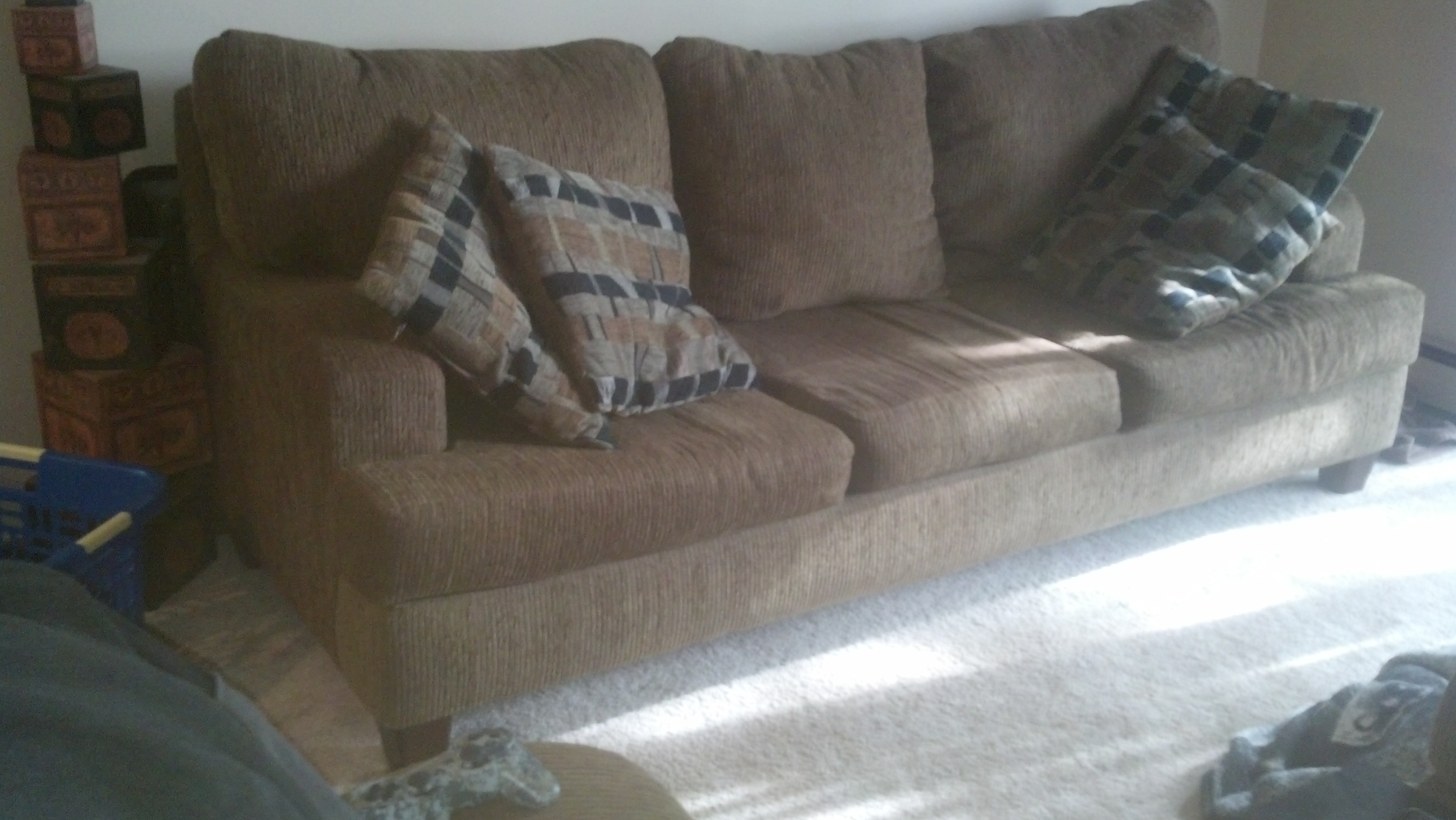 nice large couch with matching chair and ottoman