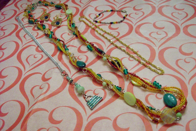 3 necklaces, 1 bracelet, 1 pair earrings group