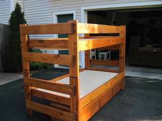 Solid knotty pine bunk bed with drawers underneath