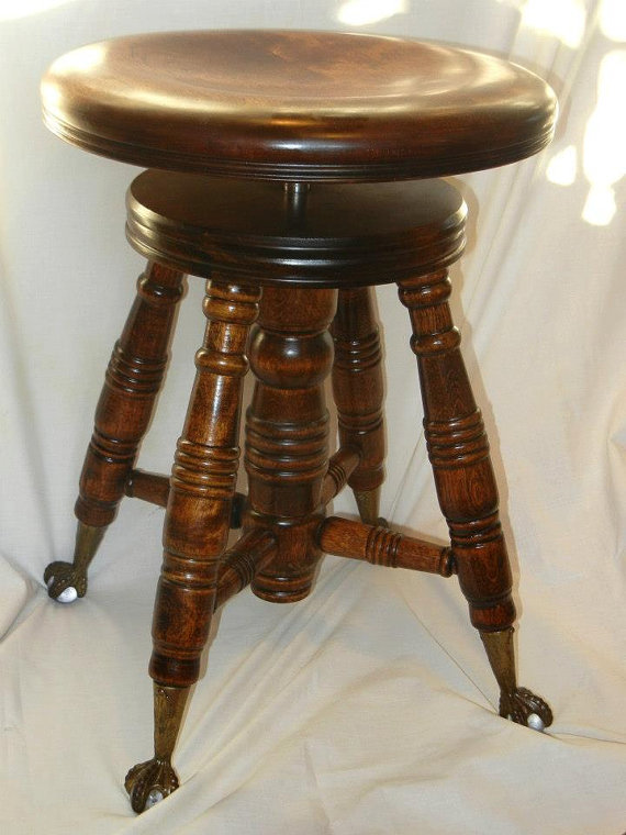 Antique adjustable piano stool w/glass ball eagle claws