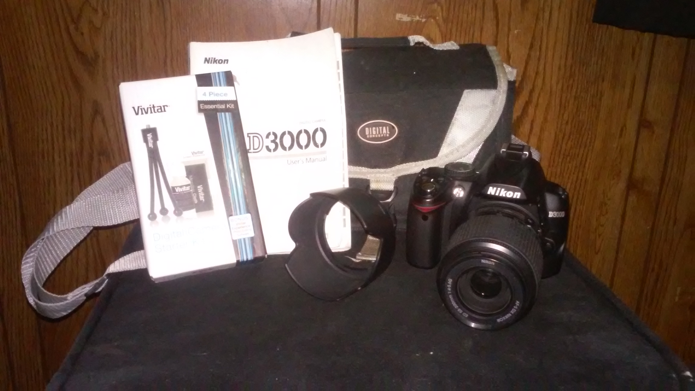 Nikon D3000 camera + 55-200 mm lens