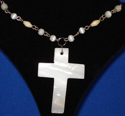 White stone cross (necklace)
