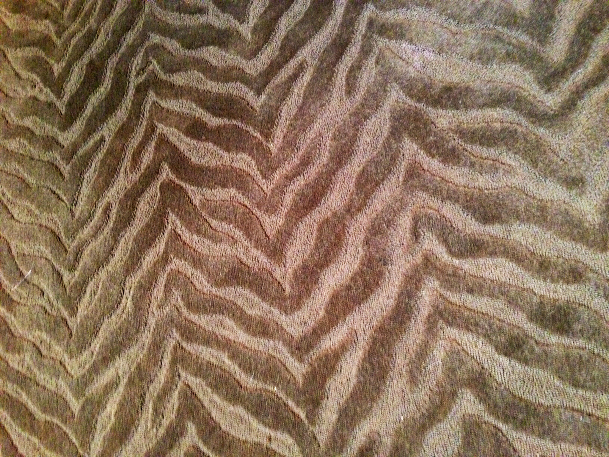 8\' chocolate brown round rug with animal stripe textured design