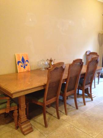 solid wood 6 chair dining room table with matching china cabinet