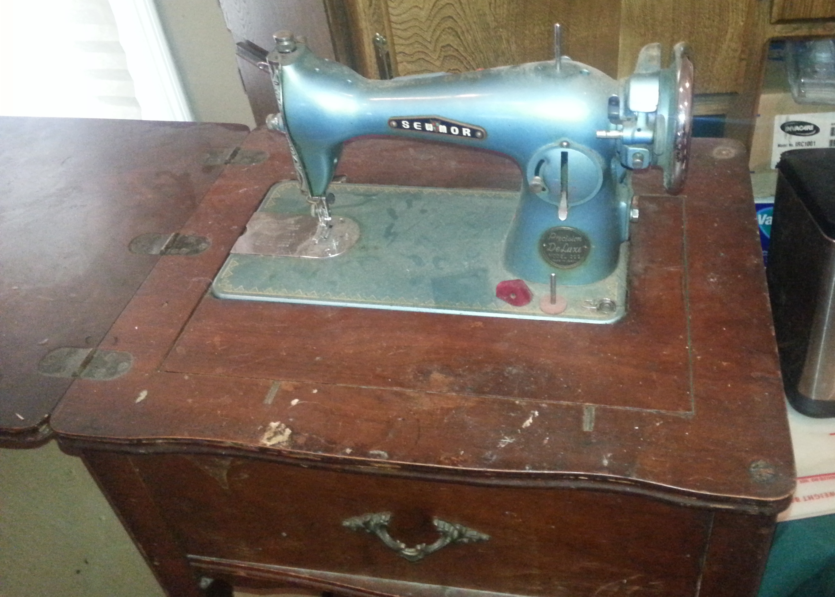 Precision deluxe antique sewing machine  (model 202 ) with wood c