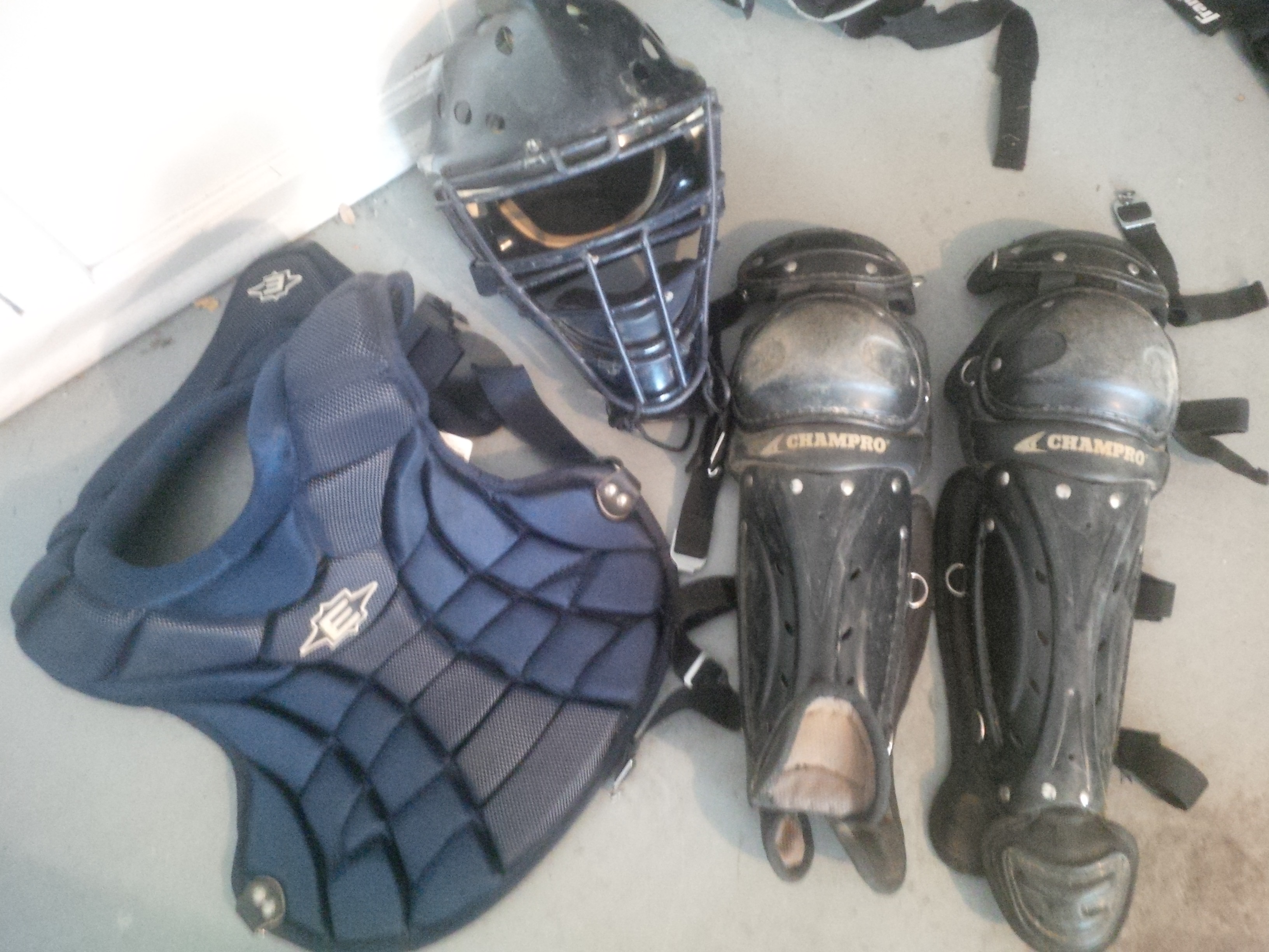 Softball catcher\'s equipment package with two chest protectors