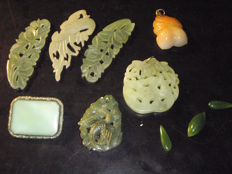 Ten pieces of genuine carved jade inc. pendants