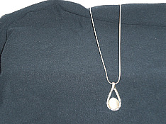 Sterling silver necklace with white stone in tear drop shape