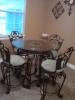 wrought iron breakfast table with four chair stools