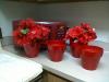 Four red planters 5 1/2 inches high by 6 inches wide at the top