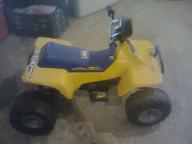 Toy Four Wheeler.... Needs new battary and cables.