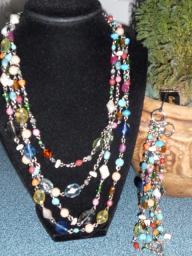 Multi colored jeweled crystal necklace & bracelet set