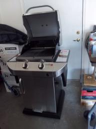 gas grill/ never been used /full gas tank/ canvas cover