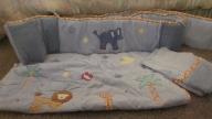 Baby crib bumper, comforter, and valance in animal print