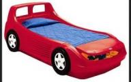 Red toddler race car bed.