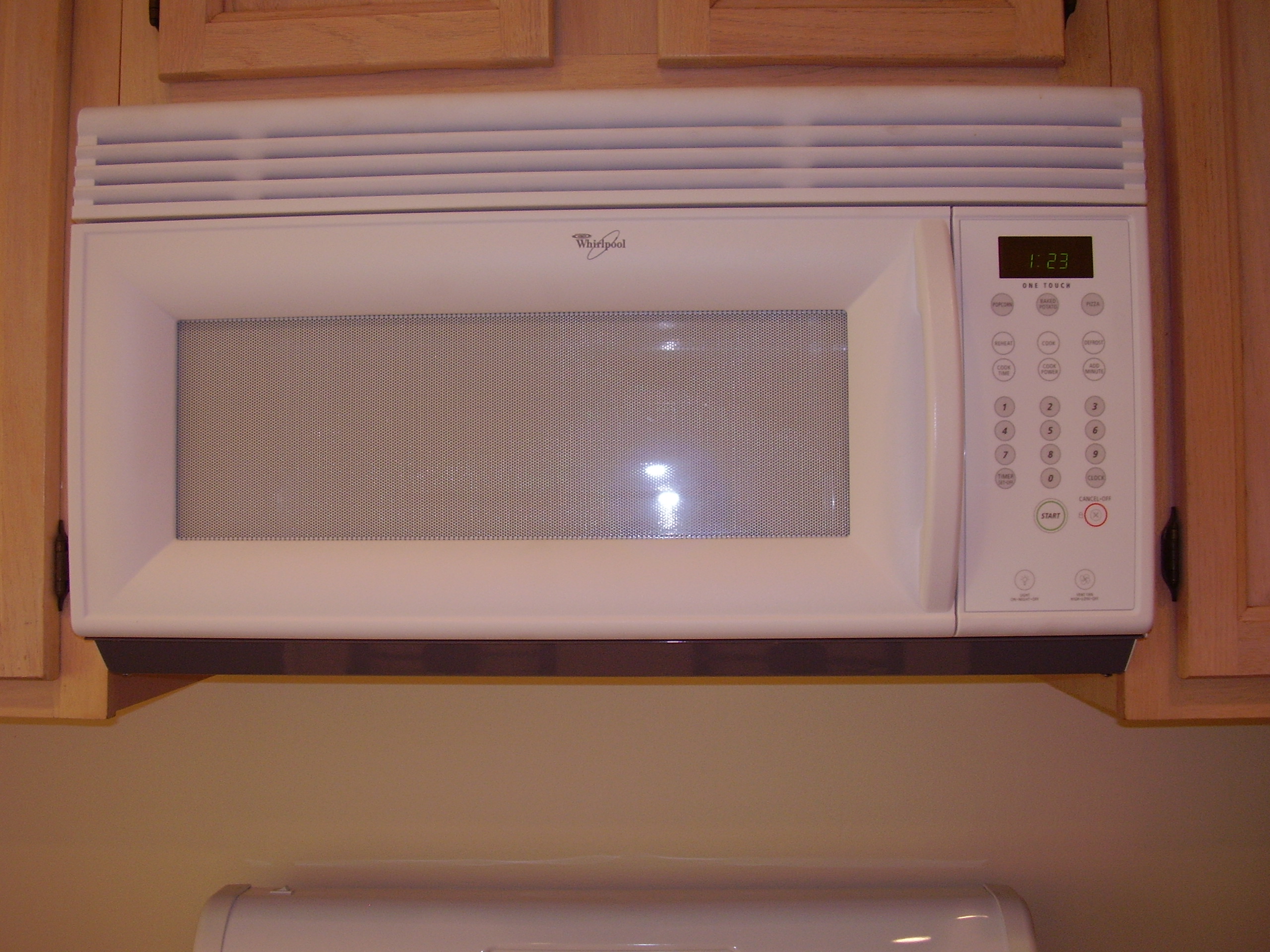 Whirlpool One Touch (over stove) Microwave in warden's Garage Sale